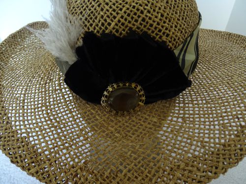 Here is a detail of the pleated cockade at the front of the hat.